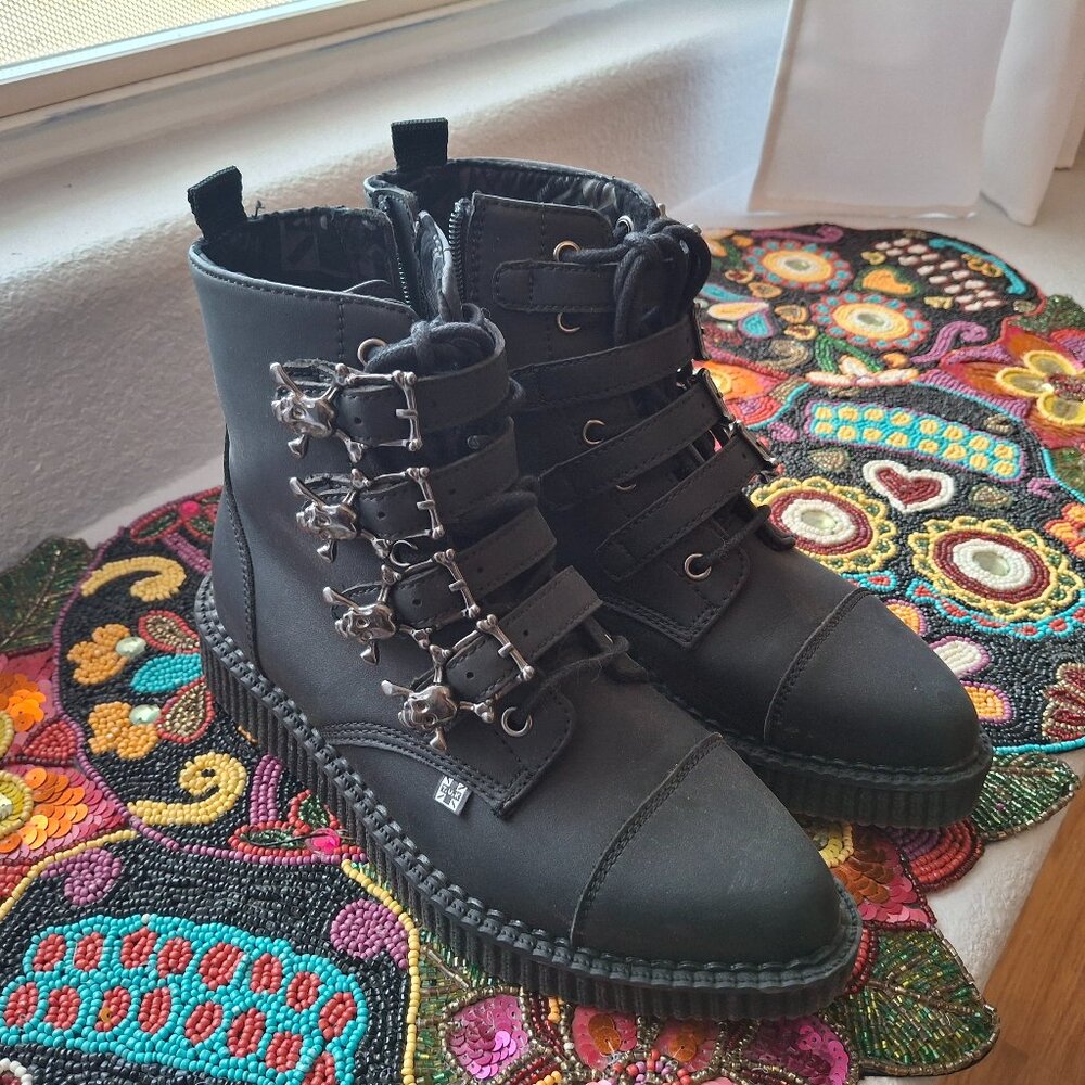 Black TUK vegan leather skull buckle pointed toe boots